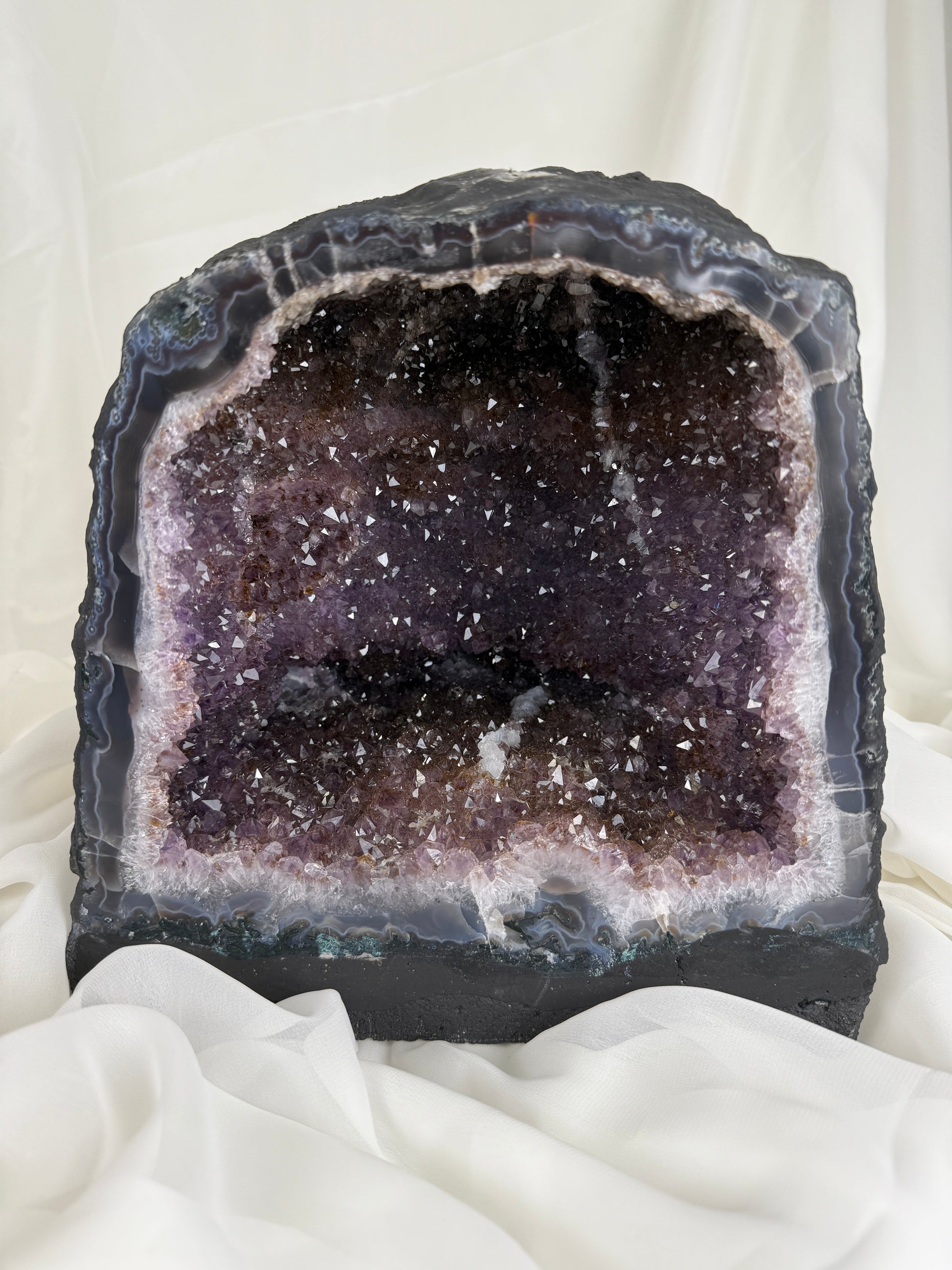 Amethyst geode on a white background