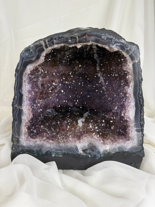 Amethyst geode on a white background